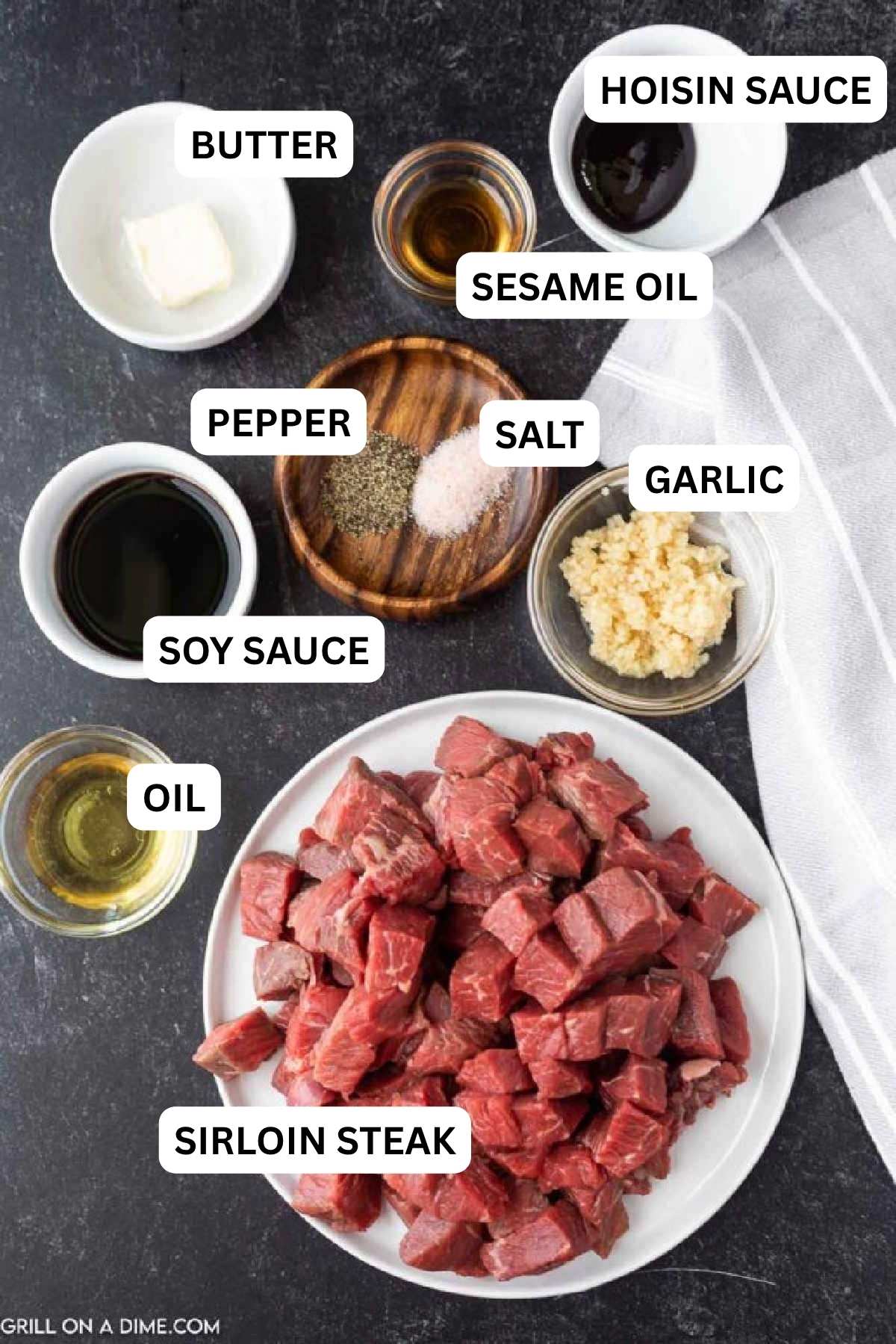 Ingredients needed to make this recipe which includes Sirloin Steak, sesame oil, vegetable oil, soy sauce, hoisin sauce, garlic, salt, pepper, and butter.