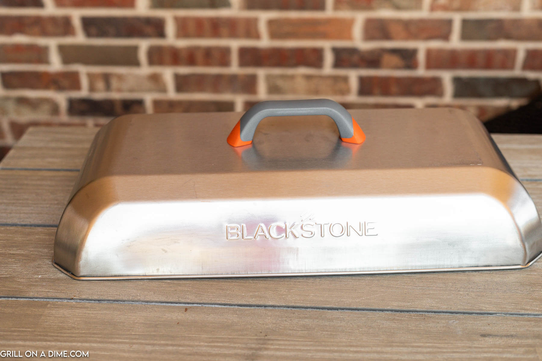 Hood Dome Cover on a wooden counter.