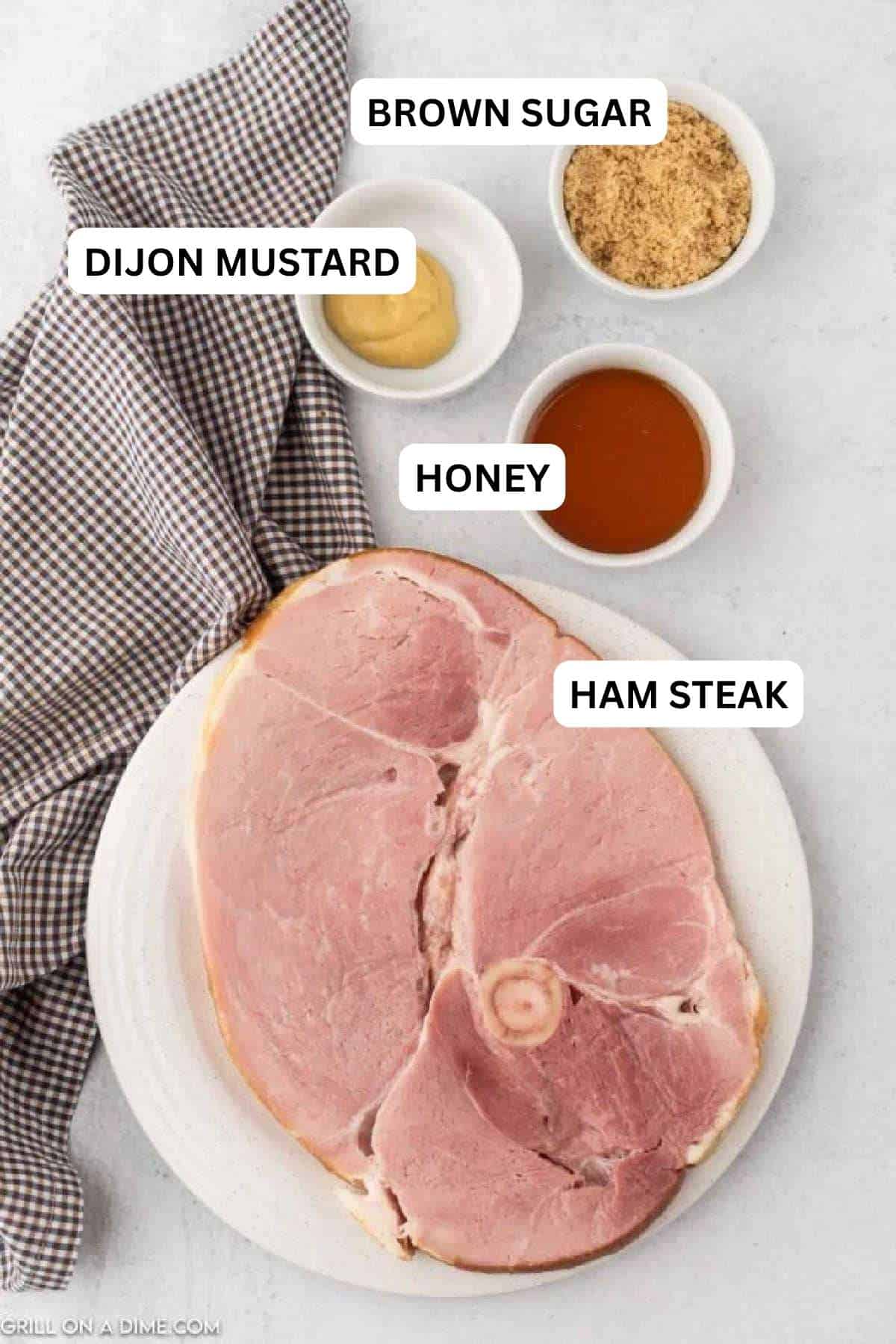 Ingredients needed to make this recipe includes ham steak, brown sugar, honey, and dijon mustard.
