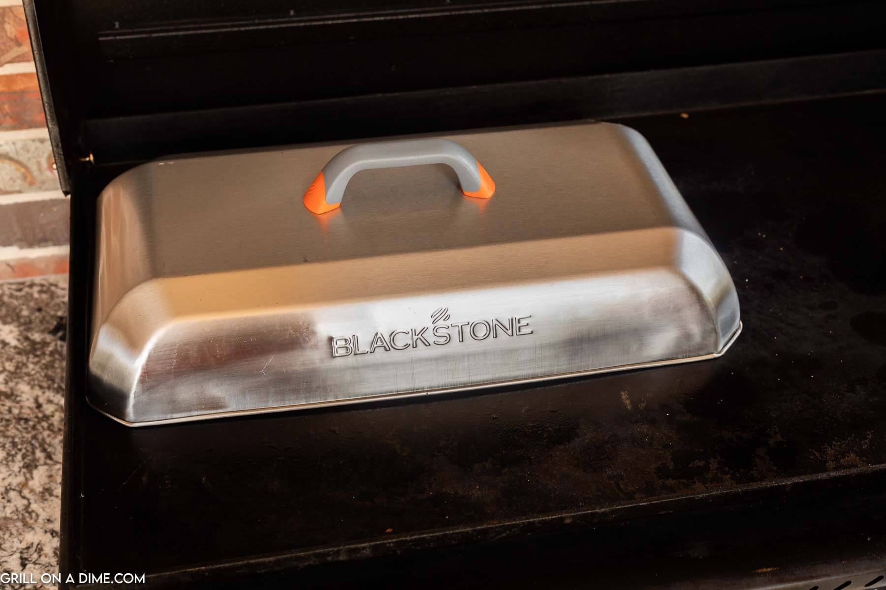 A vent hood on the griddle