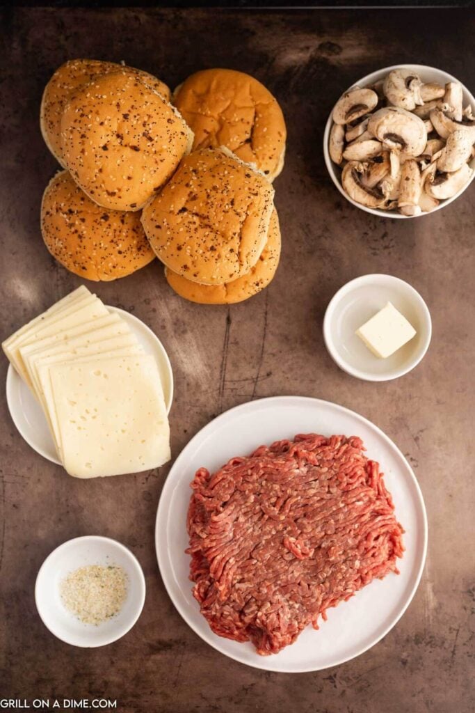 Ingredients needed - ground beef, mushrooms, butter, garlic salt, pepper, swiss cheese, hamburger buns