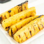 Grilled Pineapple Spears on a platter