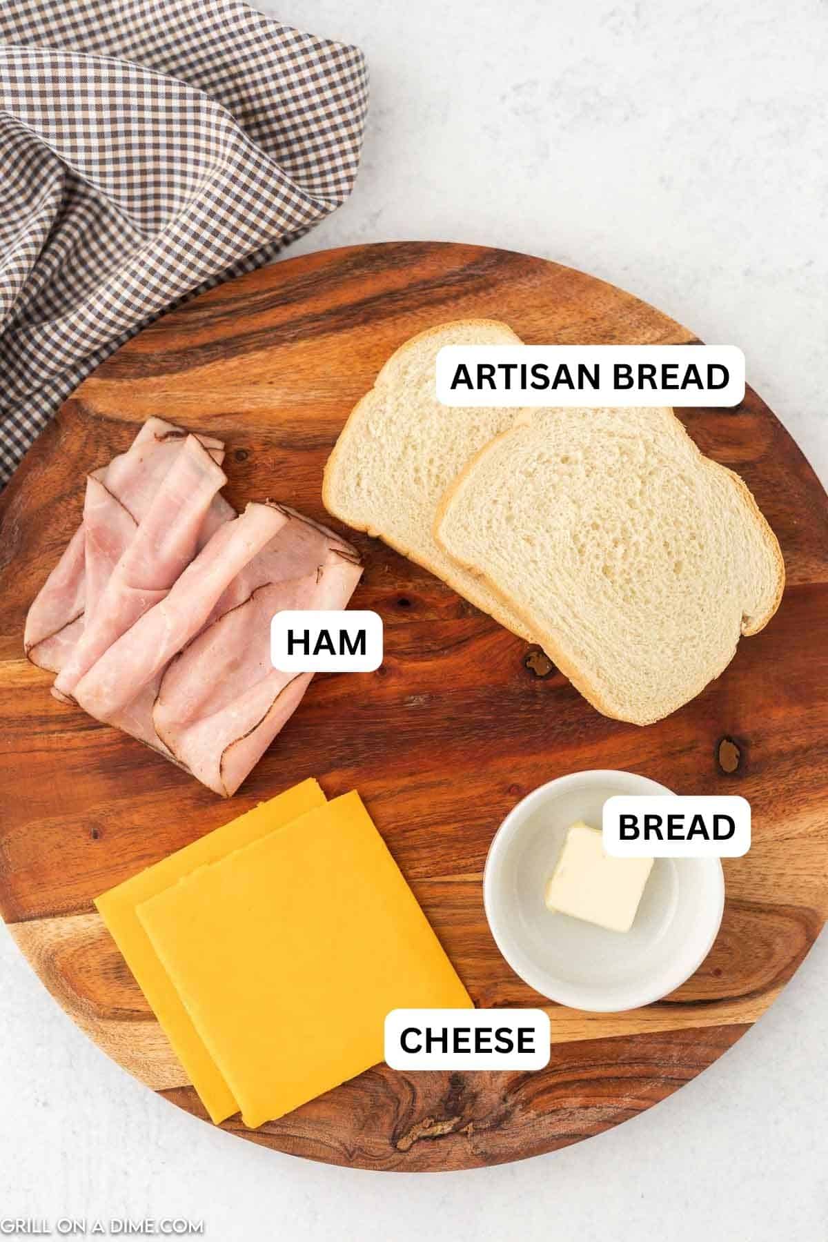 Ingredients needed for this recipe includes Artisan Bread, black forest ham, cheddar cheese, and butter.