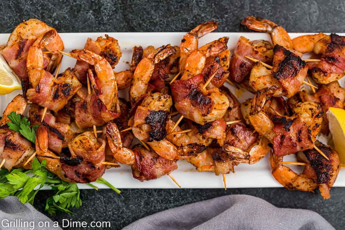 Grilled Bacon Wrapped Shrimp on a white platter