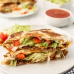 Mexican beef quesadillas on a white plate.