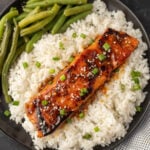 Grilled Teriyaki Salmon on a plate with white rice and green beans
