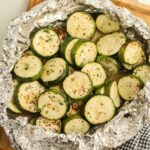 A tray of zucchini on a cutting board.