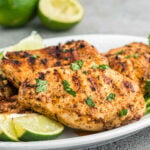 Grilled Chicken Breast stacked on a plate