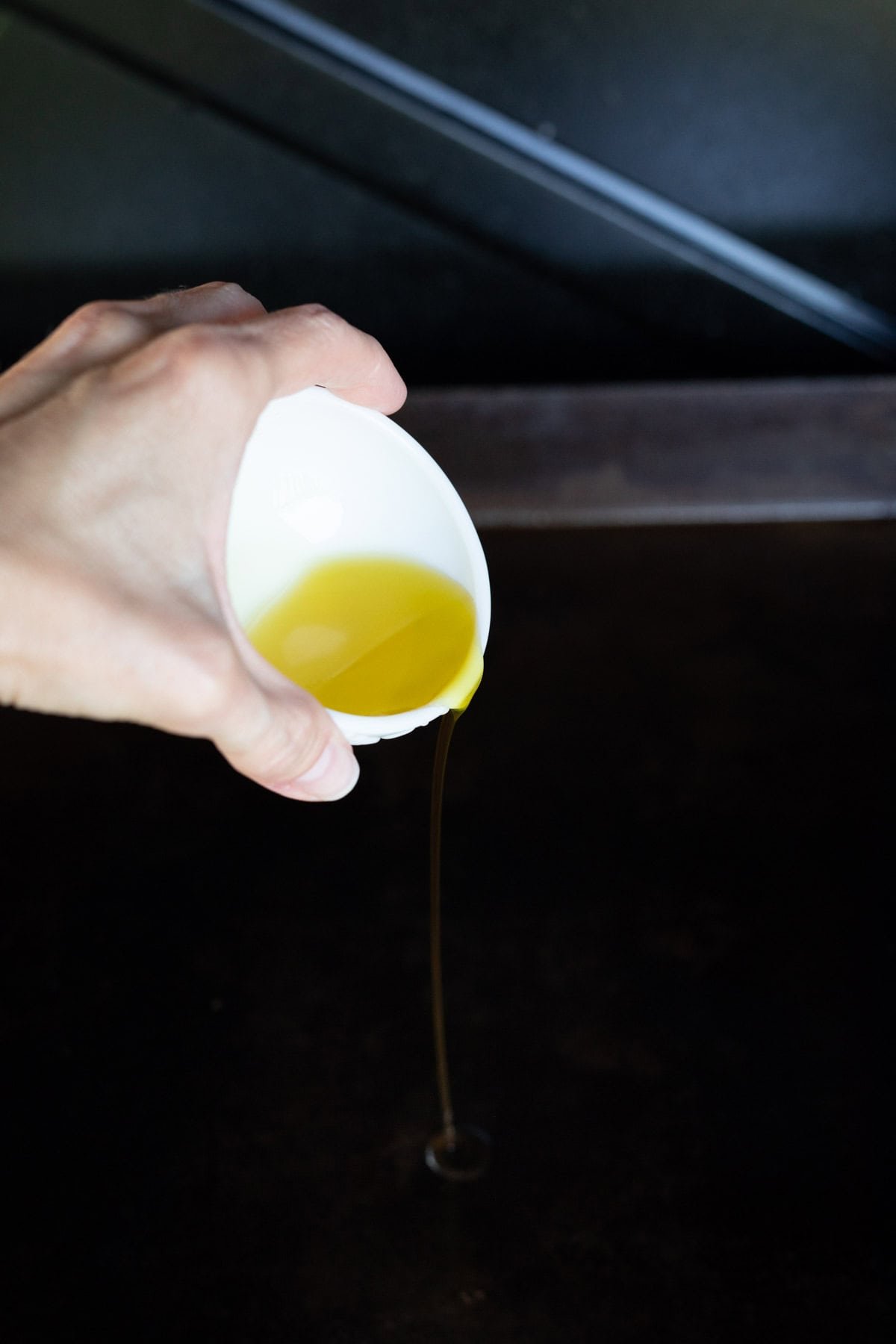 Pour oil onto the Blackstone Griddle