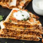Ground Beef Quesadillas topped with sour cream