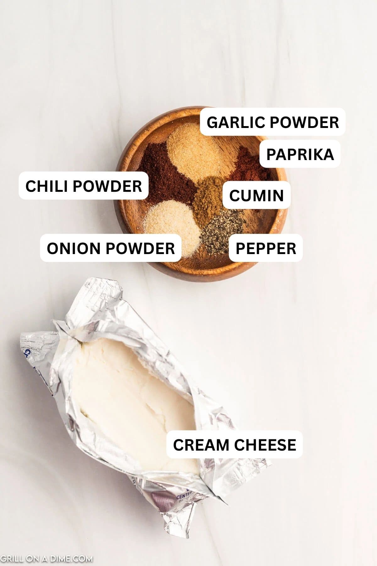 Ingredients needed to make this recipe which includes cream cheese and spices. 