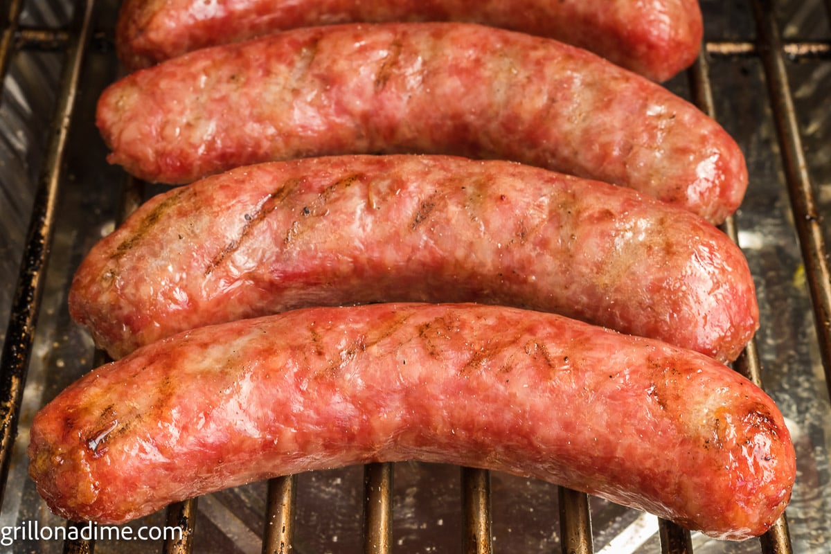 Brats in a grilled grates