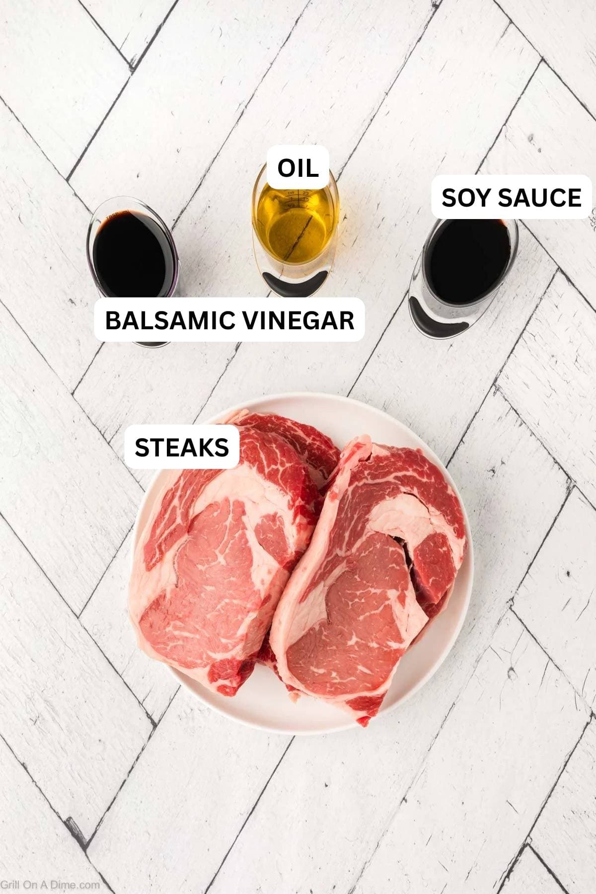 Ingredients needed to make this recipe which includes steak, oil, soy sauce, and balsamic vinegar.