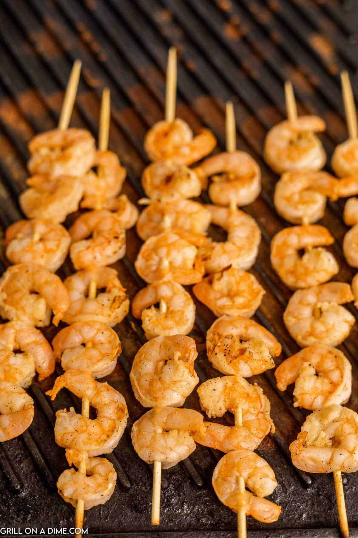 Shrimp skewers on the grill. 