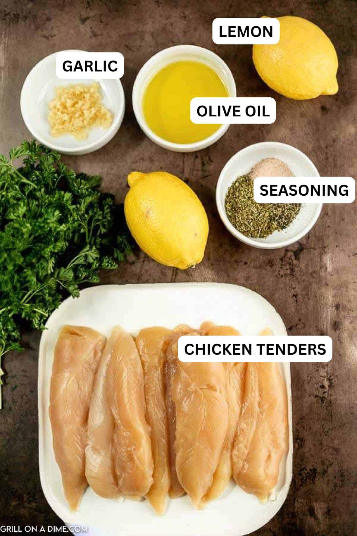 Ingredients to make this recipe which includes chicken tenders, lemon, spices and more. 