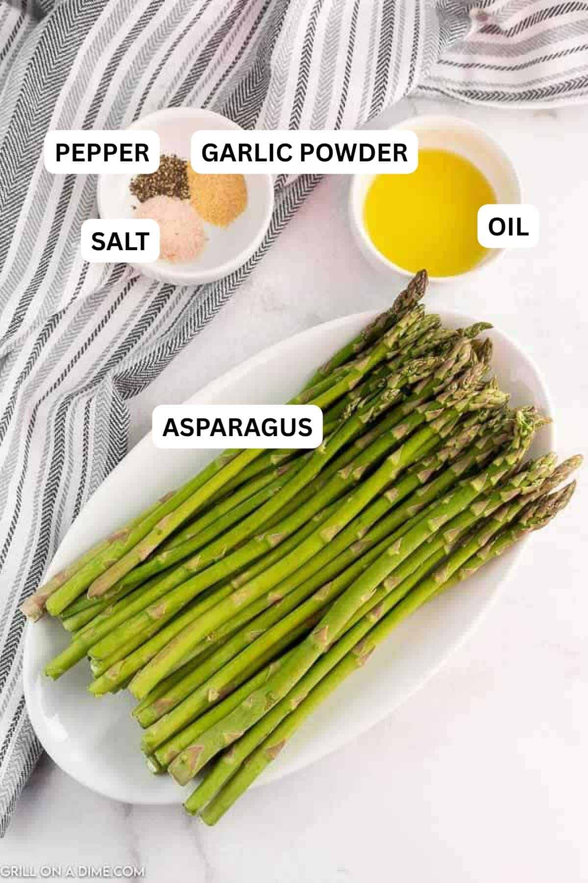 Ingredients need to make this recipe which includes Fresh Asparagus, lemon, pepper, salt and garlic powder.