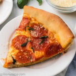 Slice of Pepperoni Pizza on a plate