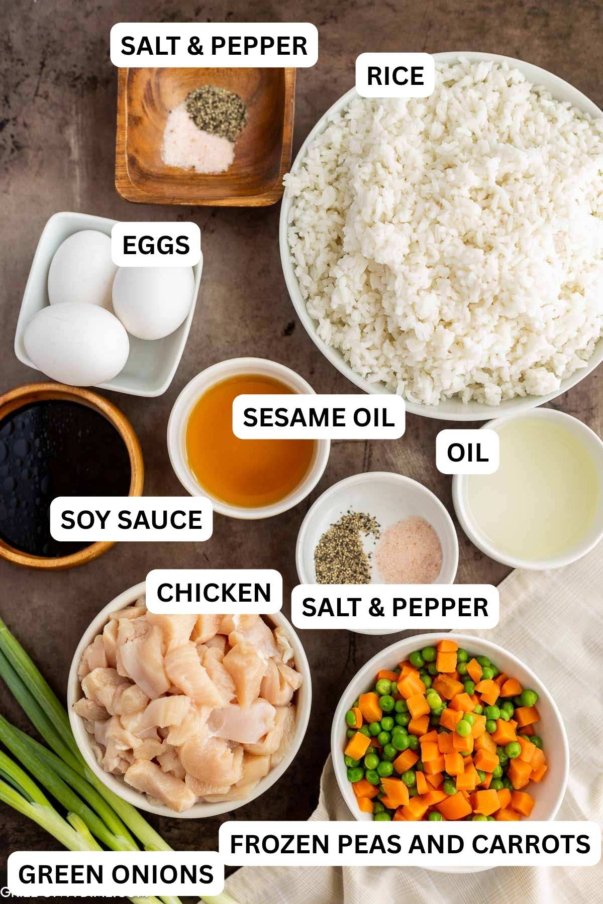 Ingredients need to make this recipe which includes cooked rice, diced chicken, eggs, soy sauce and more. 