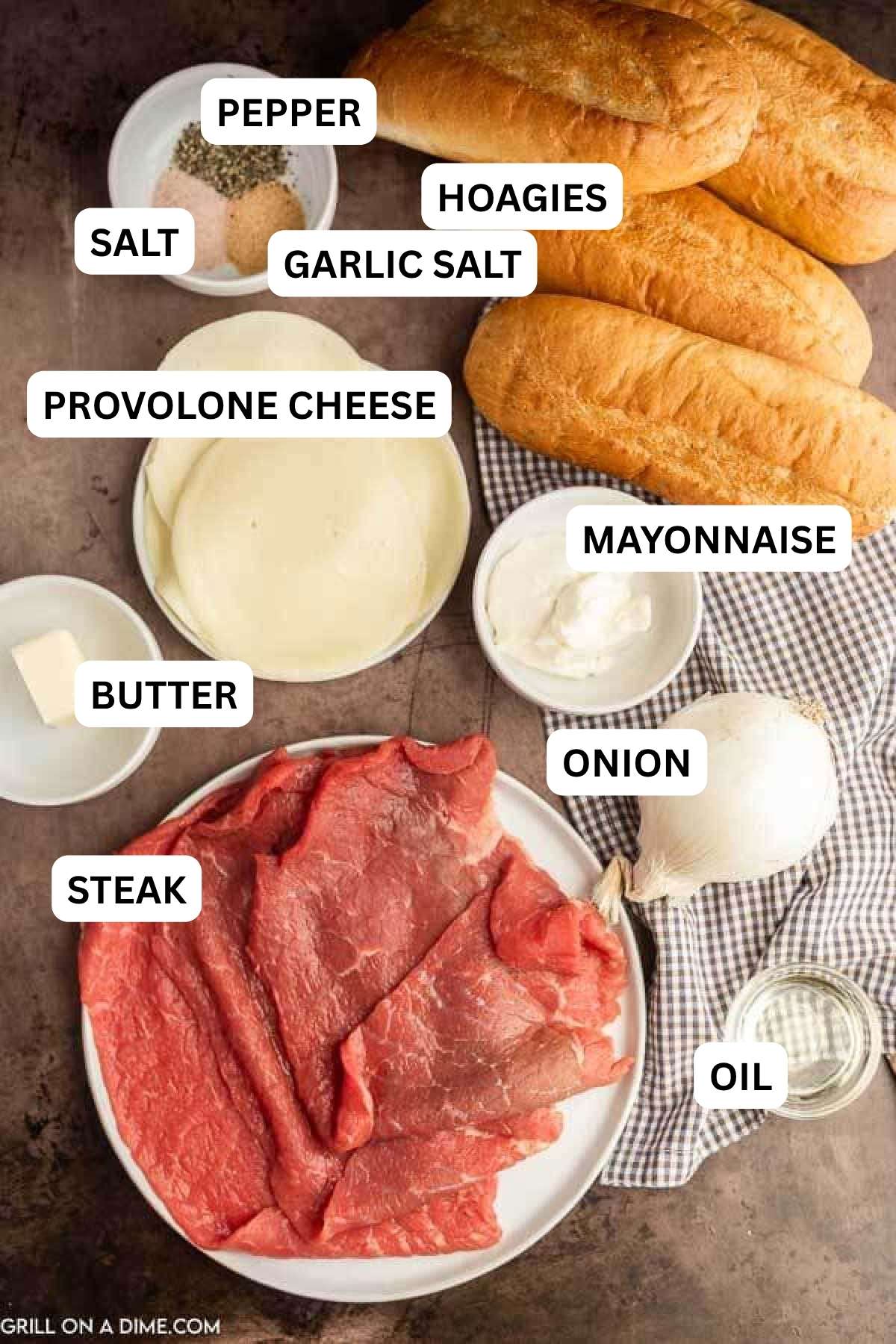 Ingredients needed to make this recipe which includes steak, slice cheese, hoagies and more. 