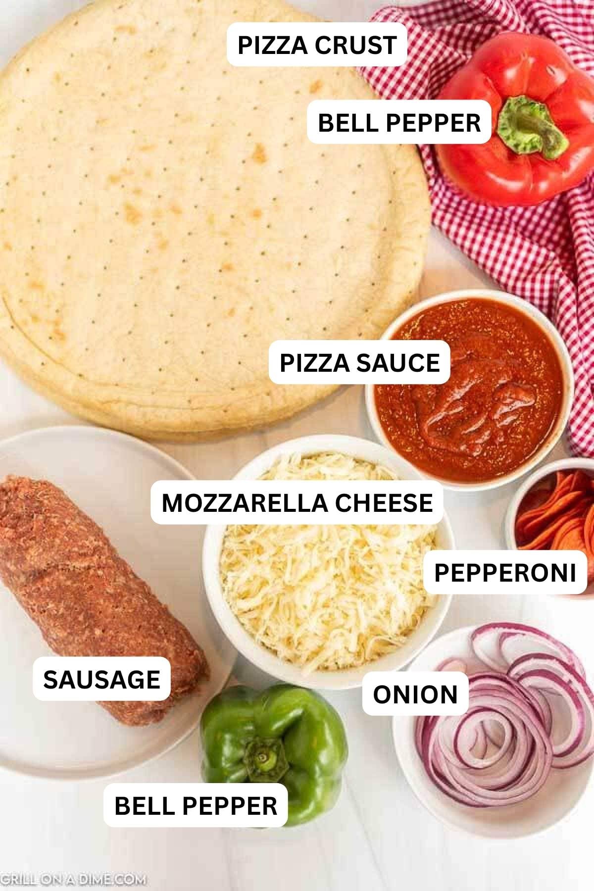 Ingredients needed to make this recipe which includes pizza crust, pizza sauce, cheese, pepperoni, sausage, red onion, red bell pepper, and green bell pepper.