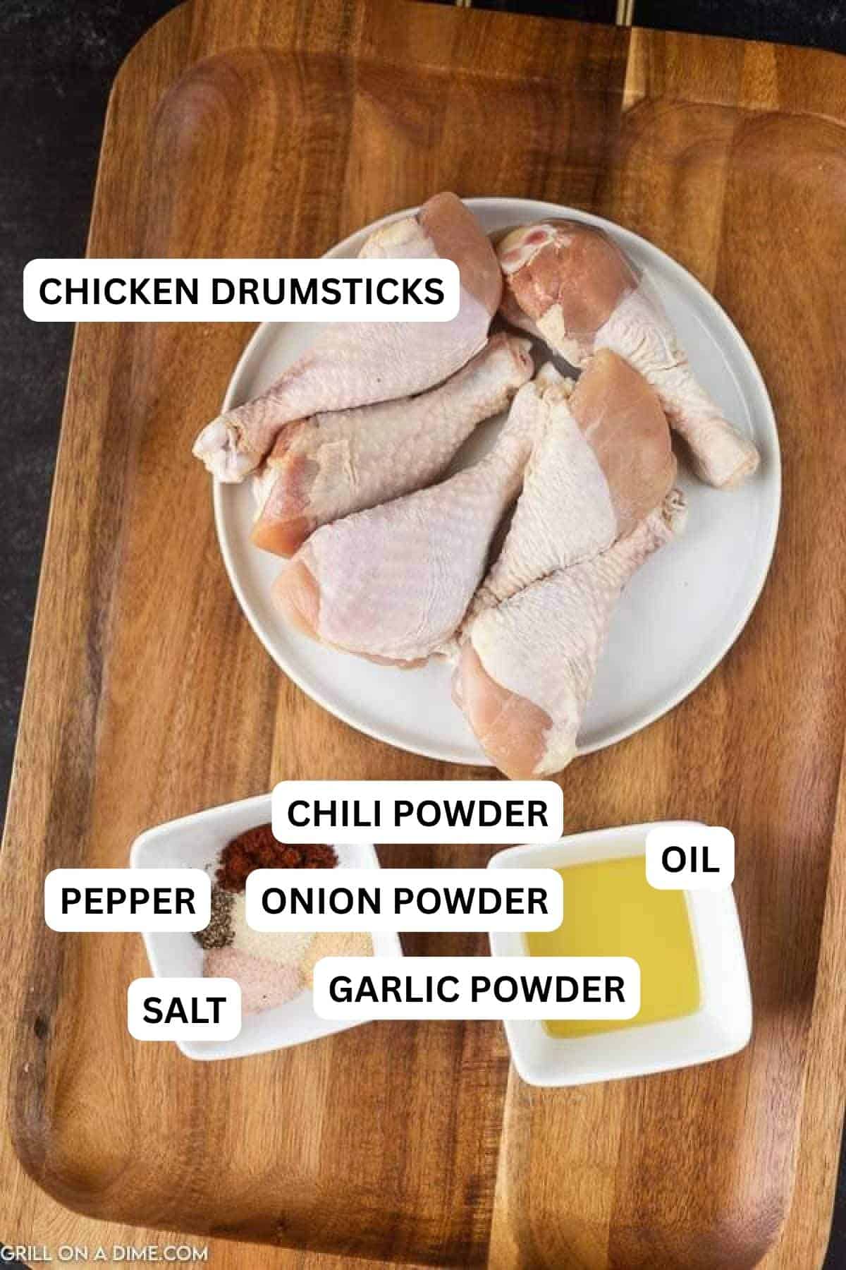 Ingredients needed to make this recipe which includes chicken drumsticks, olive oil, salt and pepper, garlic powder, chili powder, and onion powder. 