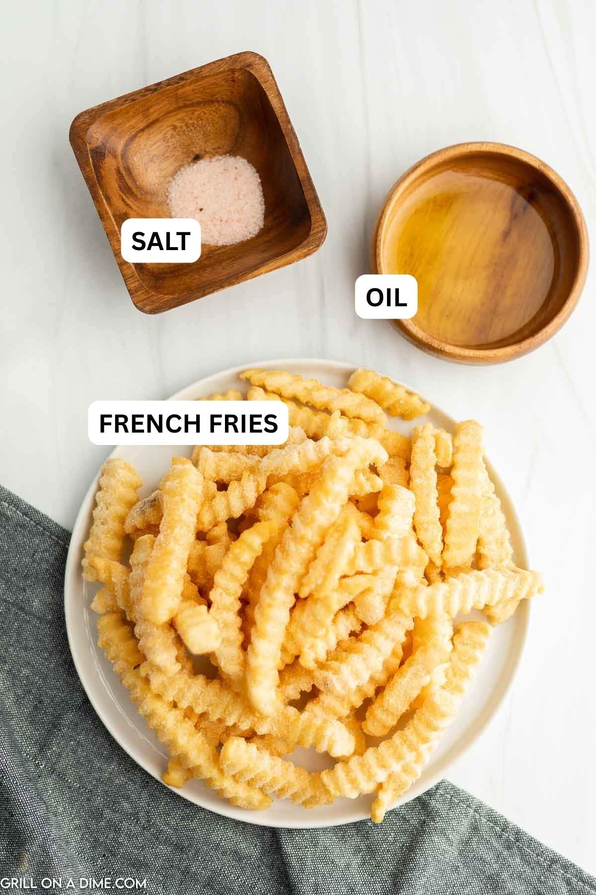 Ingredients need to make this recipe which includes, french fries, oil, and salt. 