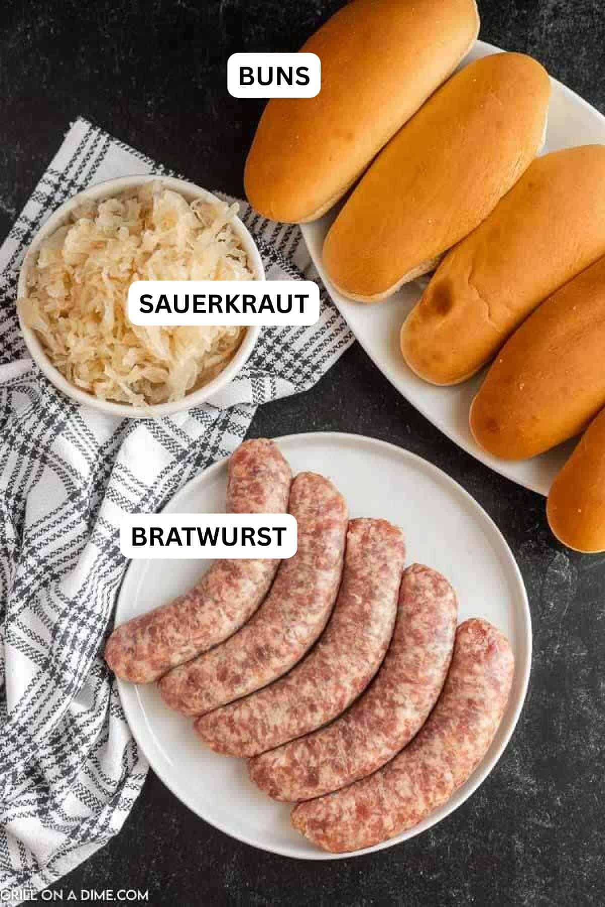 Ingredients needed to make this recipe which includes bratwursts, buns, and sauerkraut.