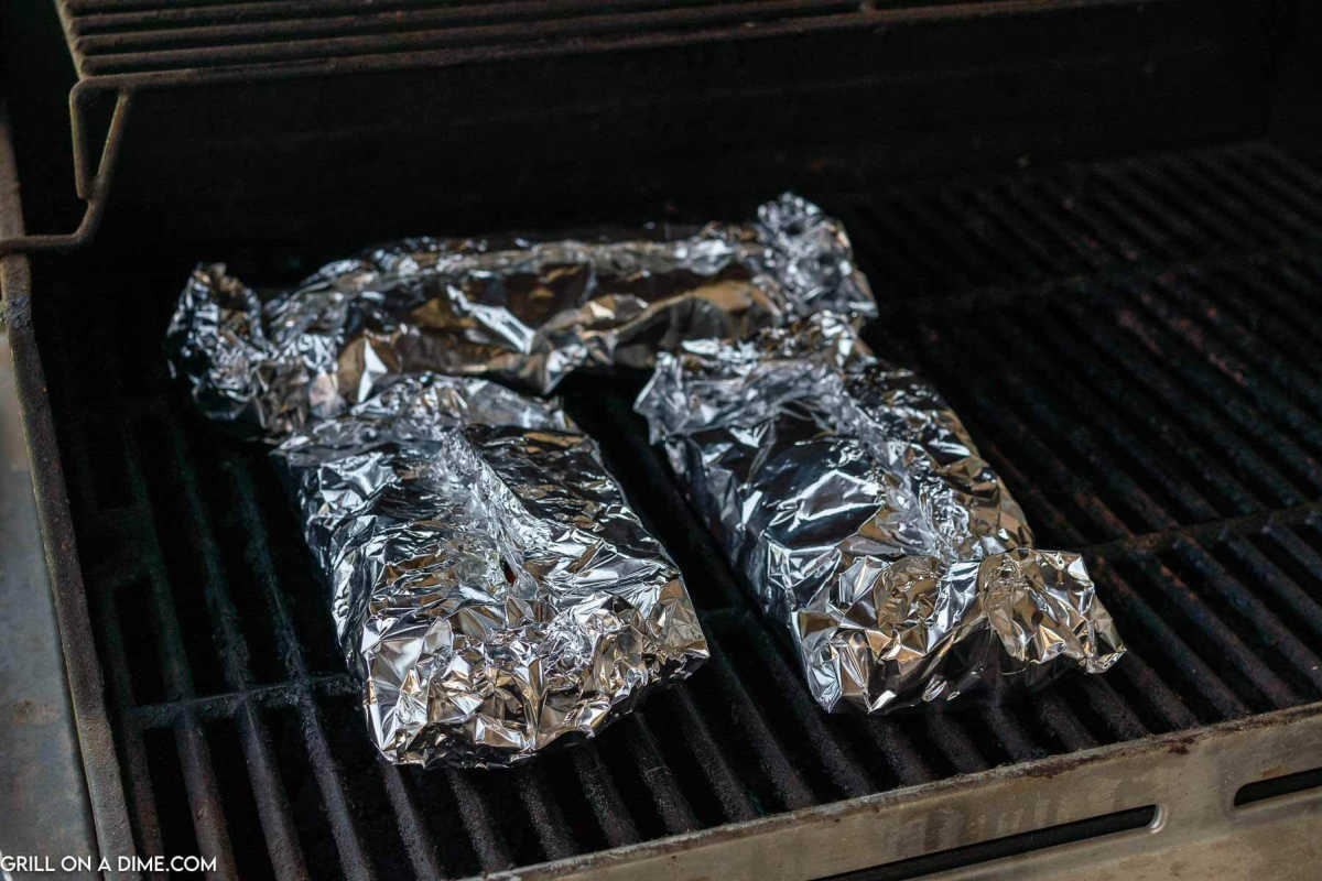 Foil packets on the grill.
