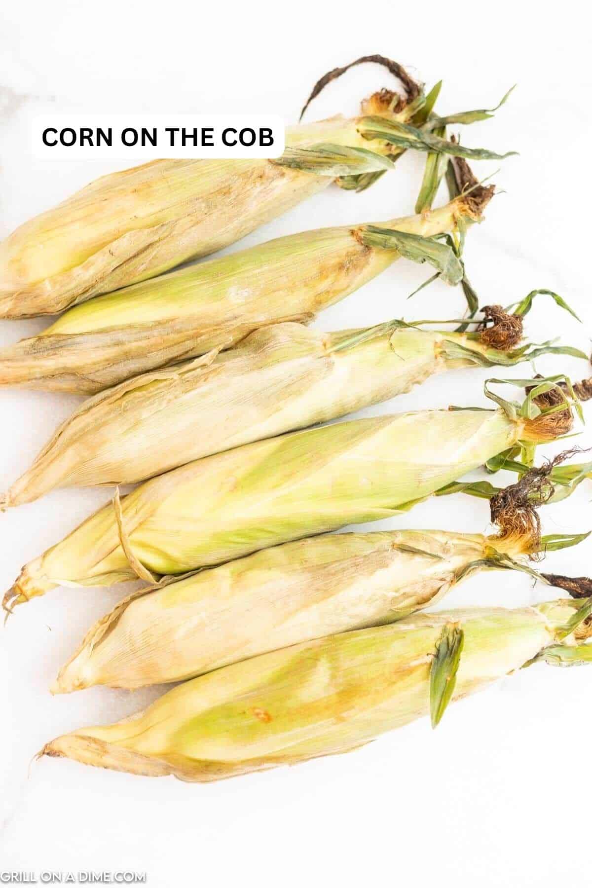 Ingredients needed to make this recipe which includes corn on the cob.