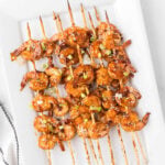 Shrimp Skewers stacked on a plate
