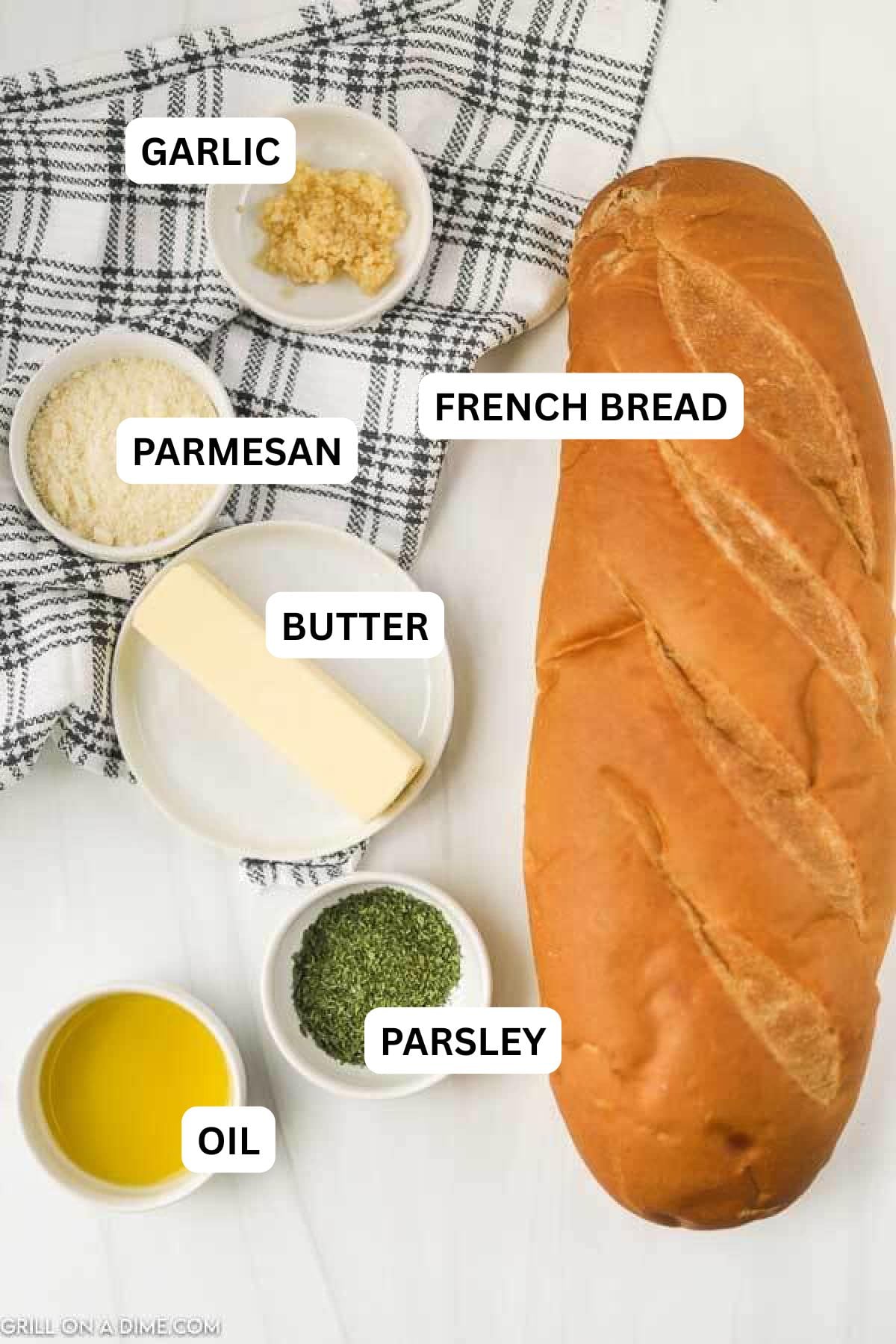 Ingredients need to make this recipe which includes a loaf of french bread, butter, garlic, parmesan cheese and more. 