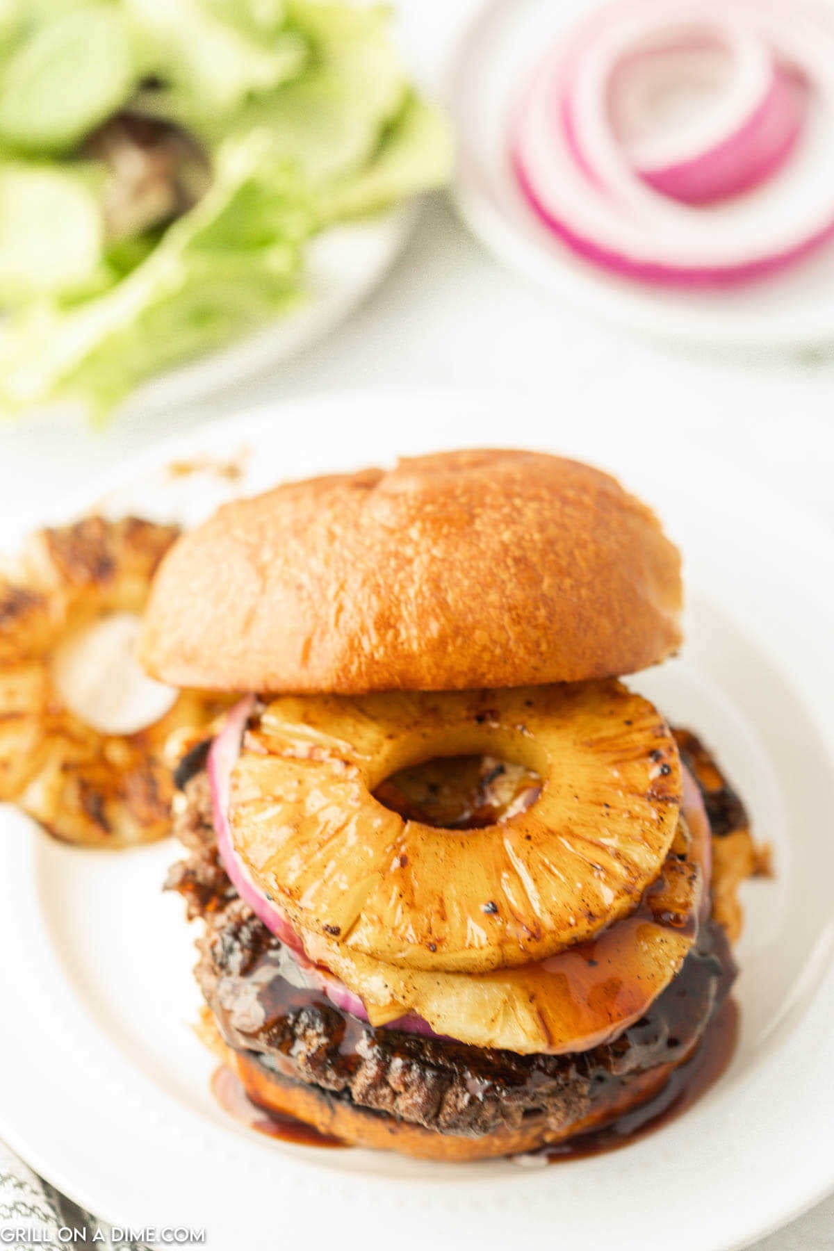 Close up image of Teriyaki Burger on a plate.