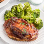 Pork Chops with bbq sauce and broccoli.