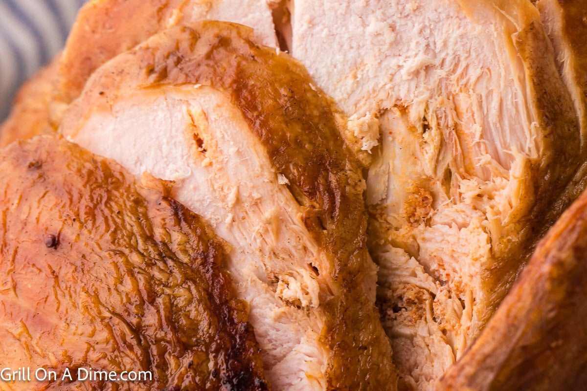 Up close Smoked turkey that is sliced.