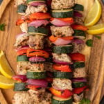 Pork kabobs with slice zucchini, red onions and bell peppers