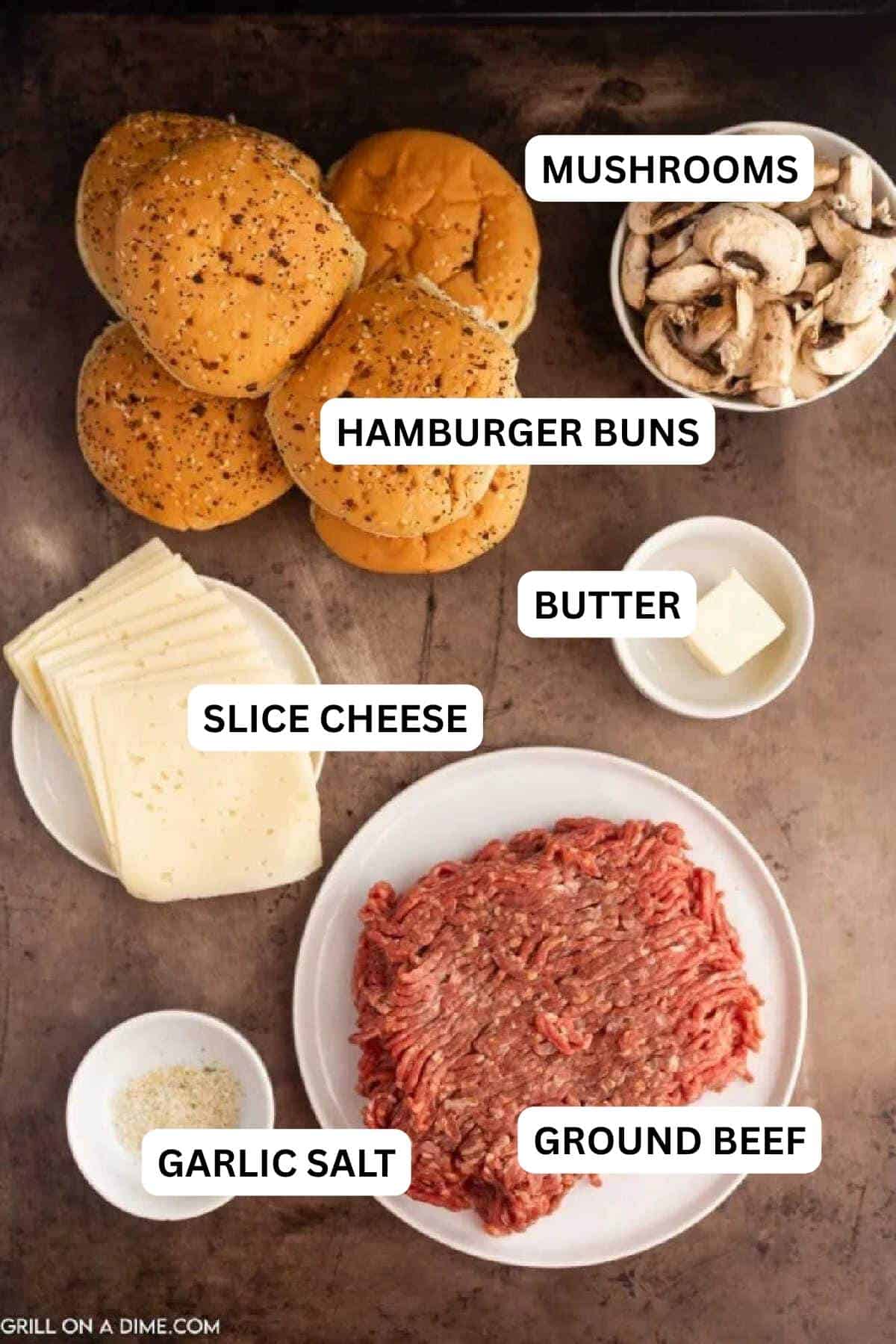 Ingredients needed to make this recipe which includes Buns, slice mushrooms, butter, swiss cheese, ground beef and seasoning.