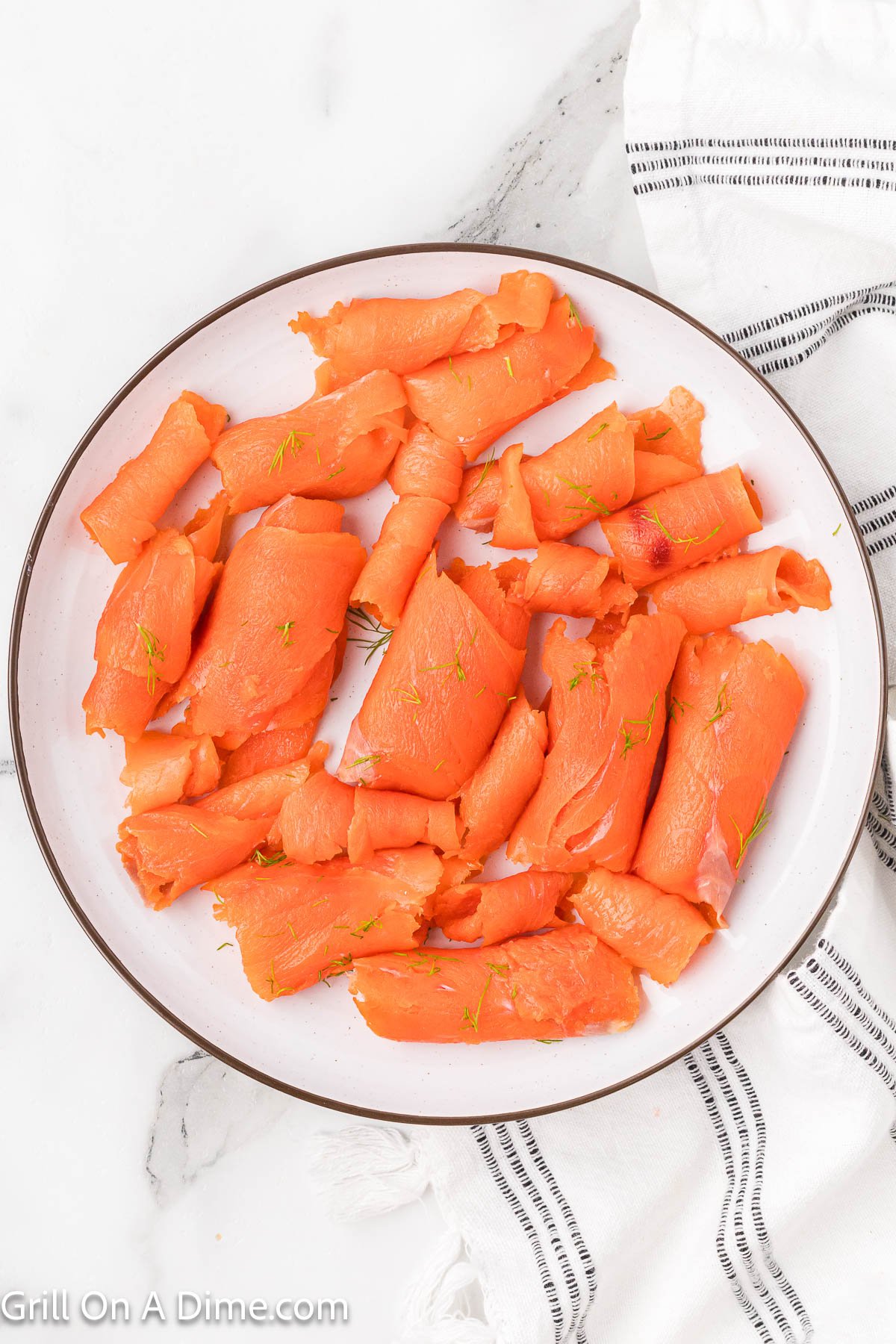 Thin slices of salmon on a plate