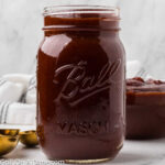 Homemade bbq sauce in a mason jar.