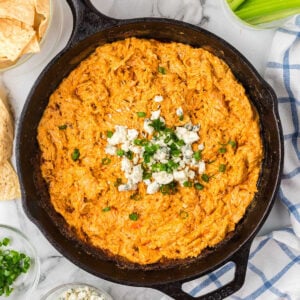 Buffalo chicken dip in a skillet.