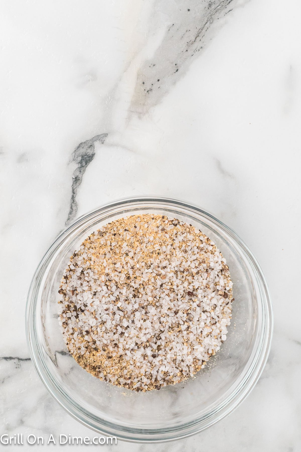 Combining the spices in a bowl