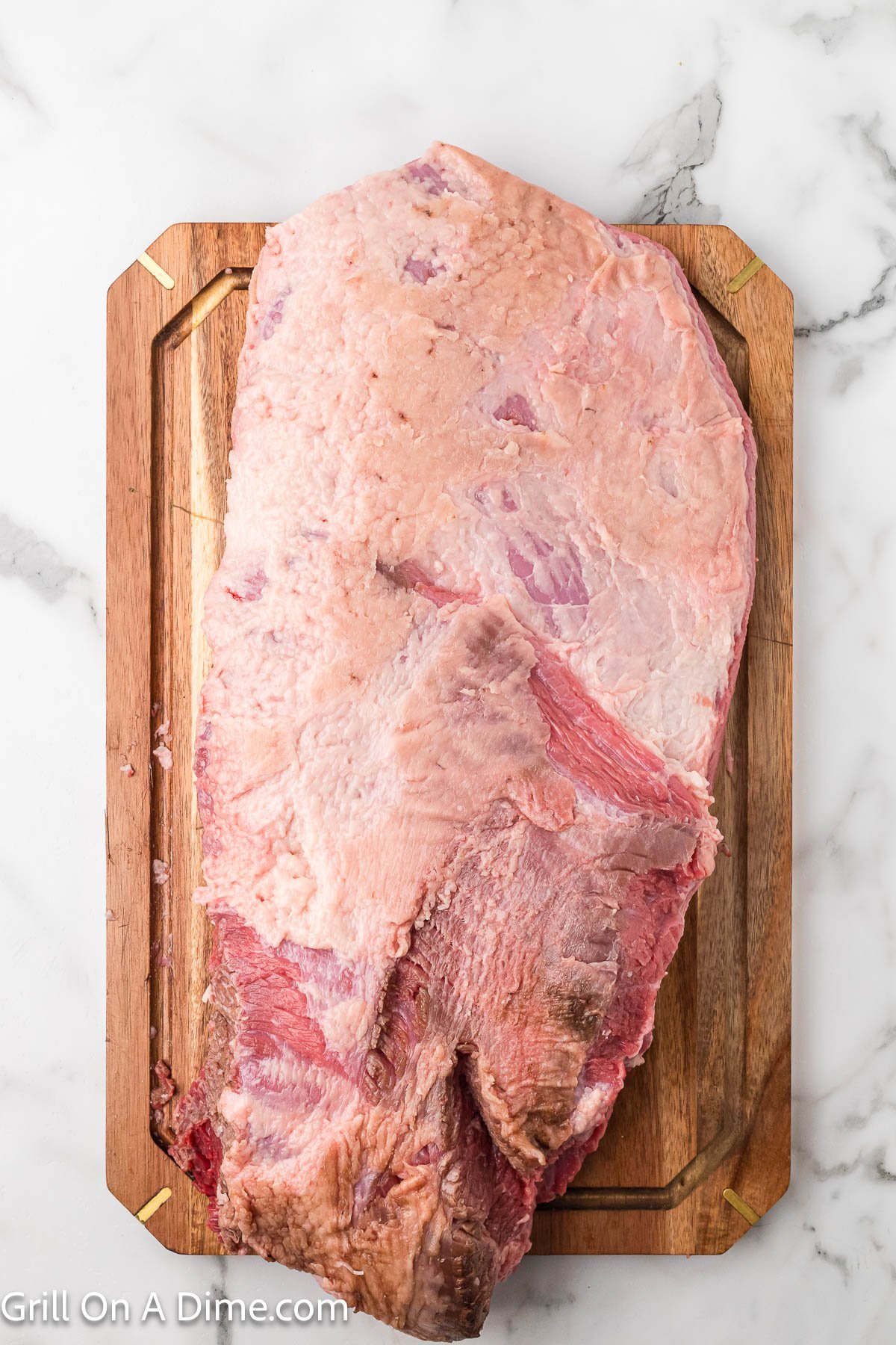 Raw Brisket on a cutting board