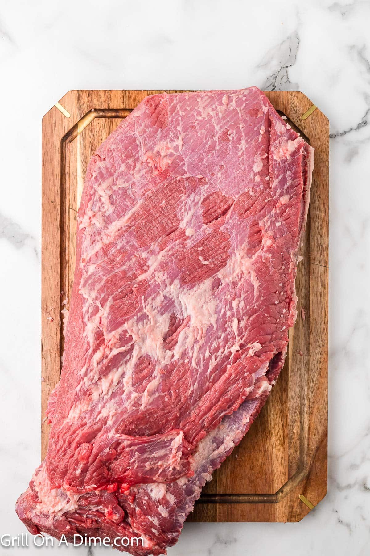 Trimmed Brisket on a cutting board