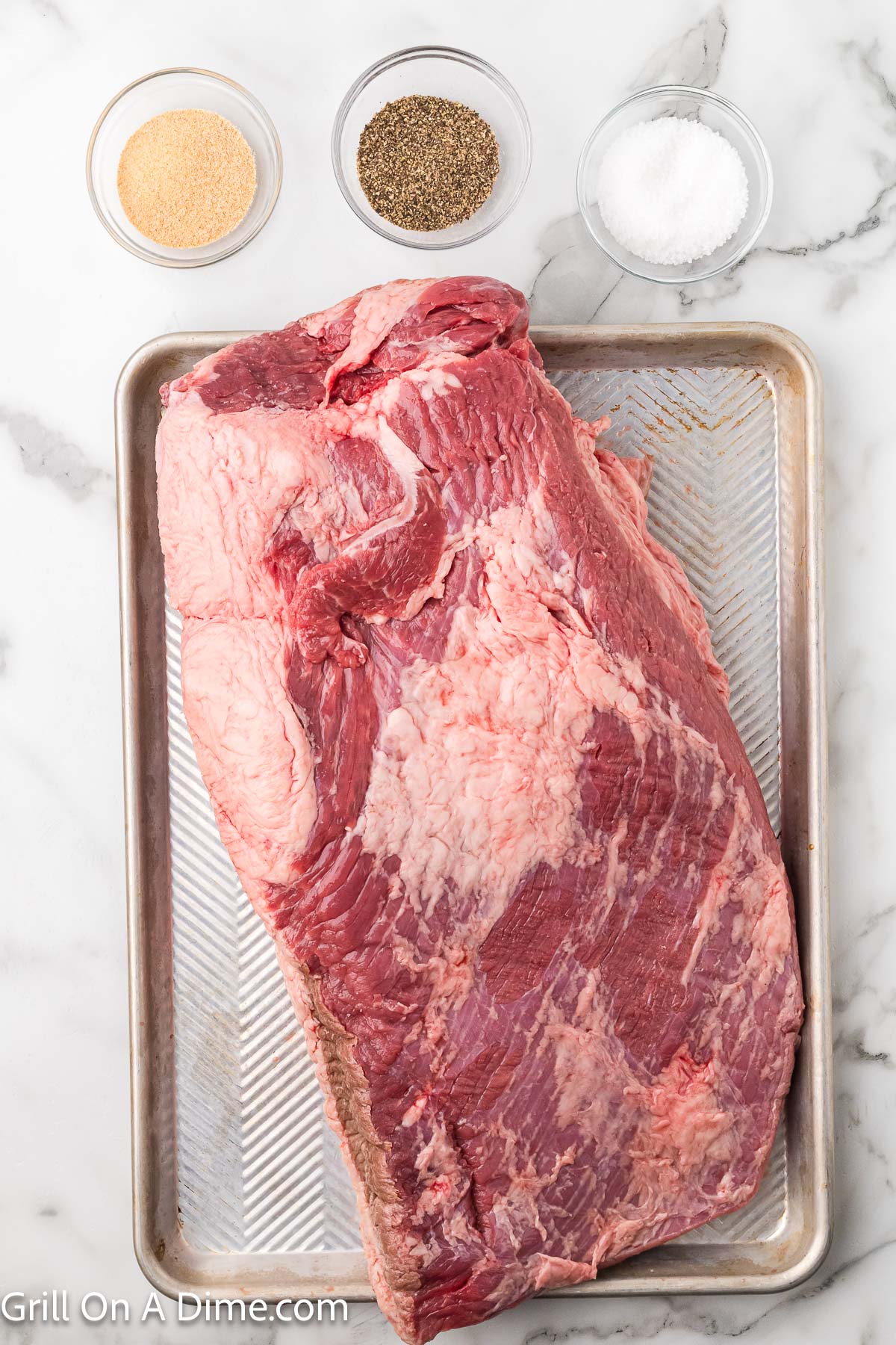 Ingredients - Brisket, salt, pepper, and garlic powder