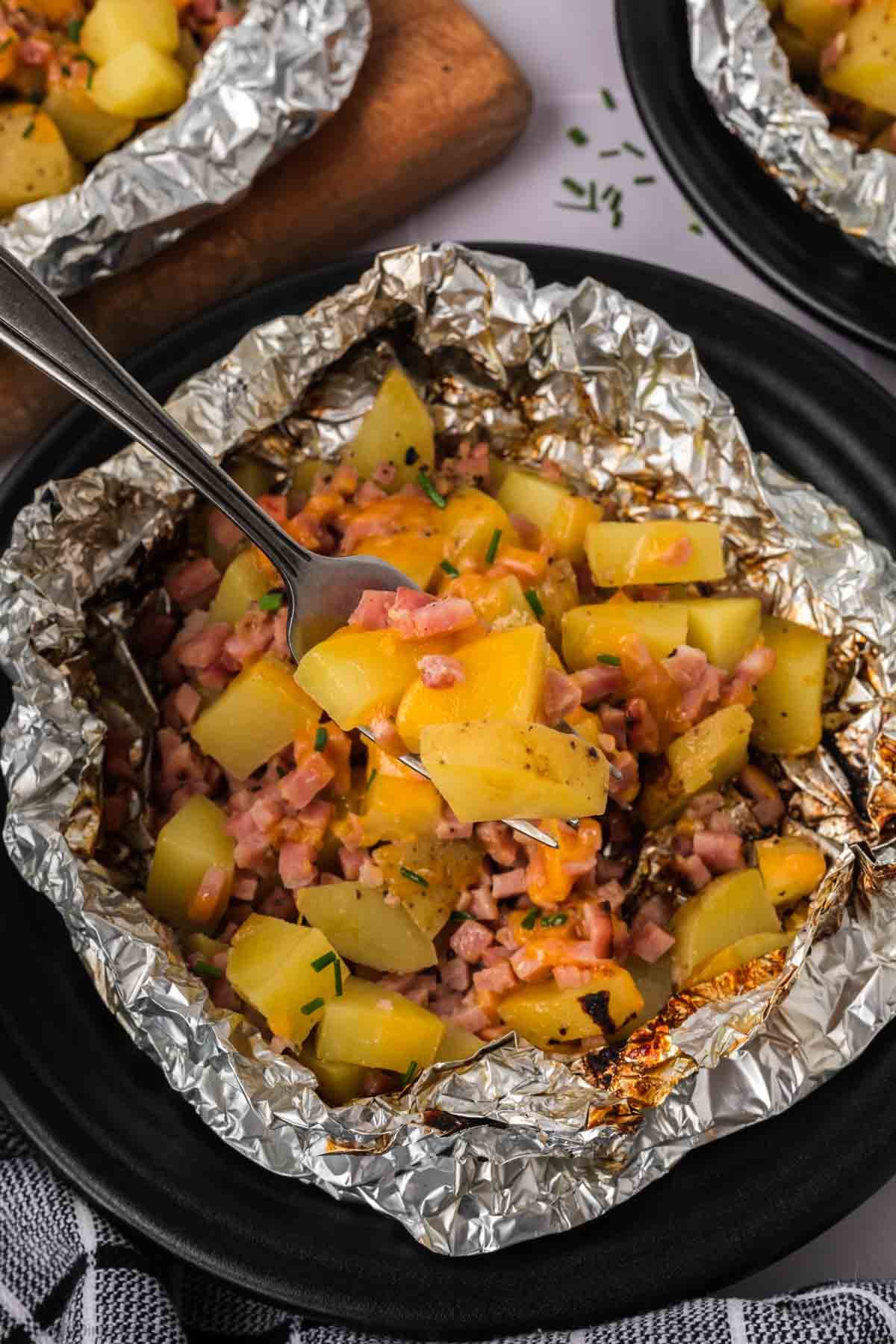 Diced potatoes and and ham with foil packets