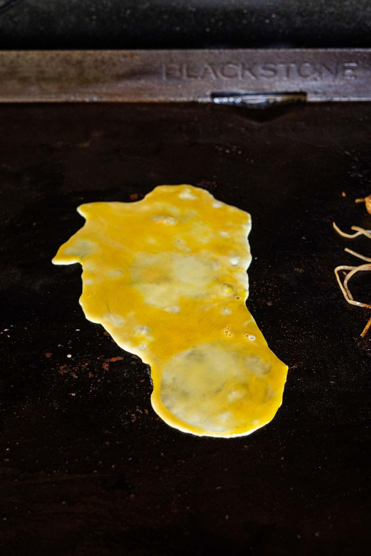 Scrambled eggs poured onto the Blackstone Griddle