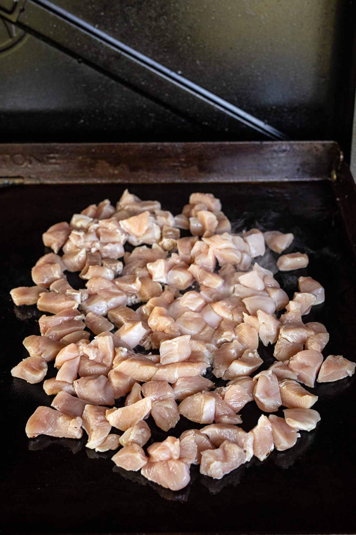 Cooking dice chicken on the Blackstone