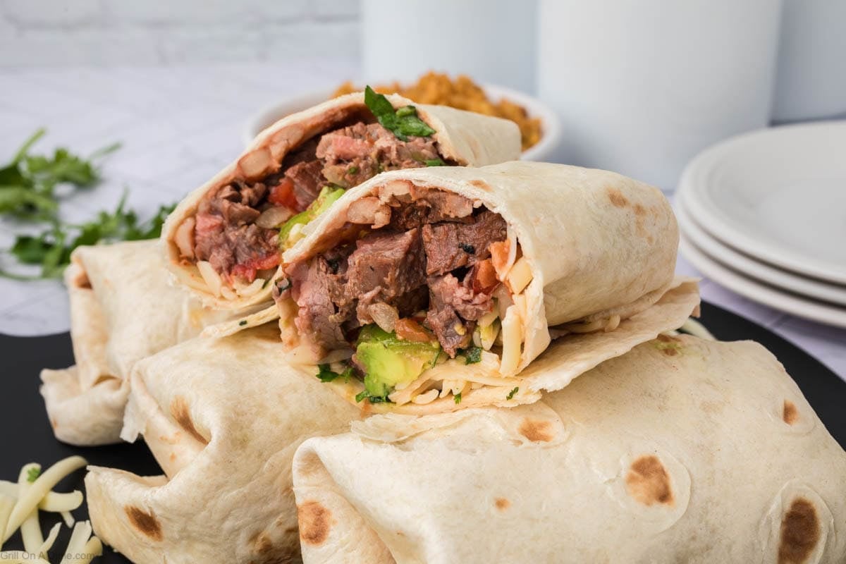 Carne Asada Burritos cut in half and stacked 