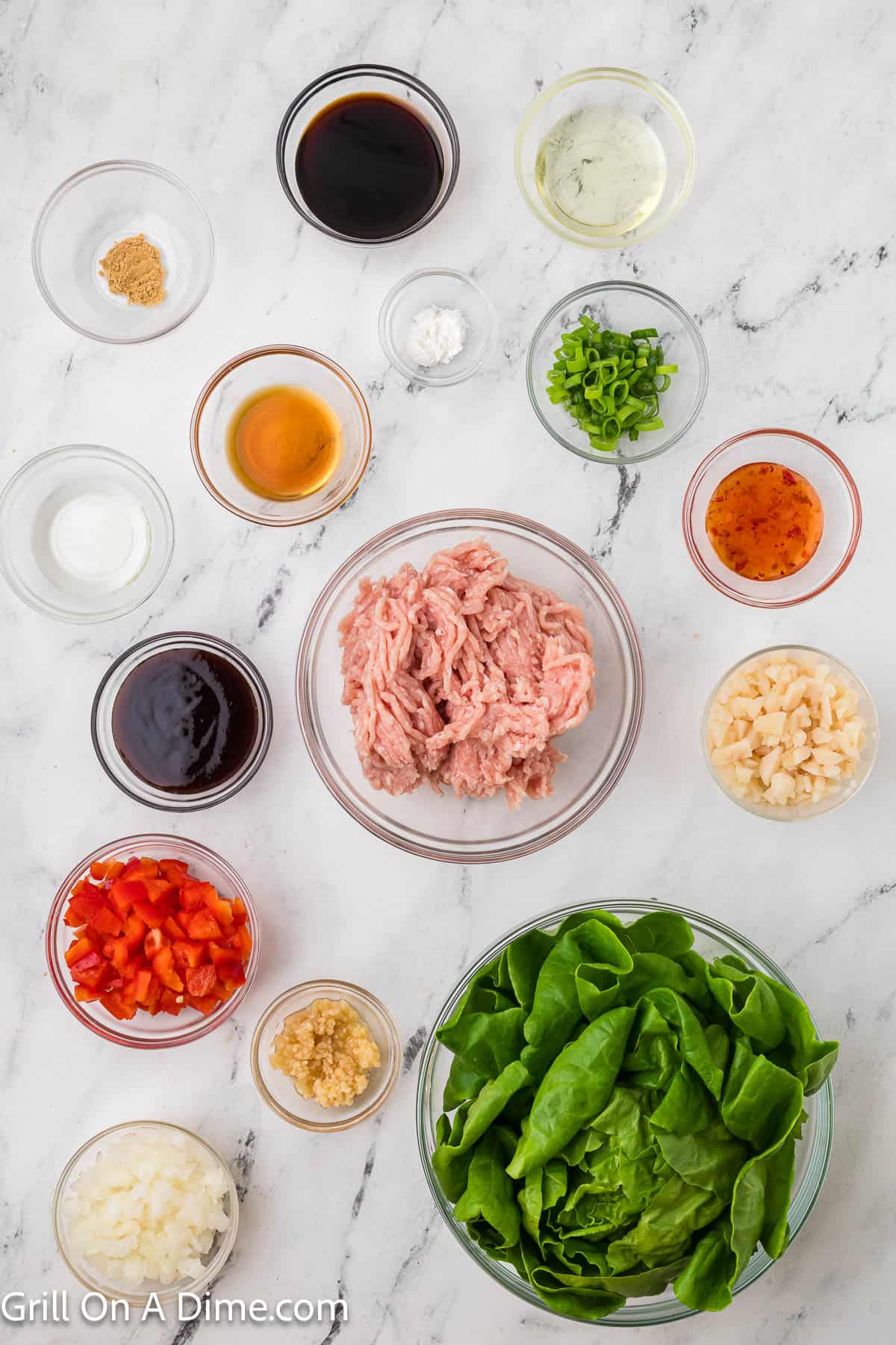 Ingredients - Ground chicken, oil, onion, red bell pepper, water chestnuts, garlic, butter lettuce, green onions, hoisin sauce, soy sauce, rice wine vinegar, sesame oil, sweet chili sauce, ginger, cornstarch