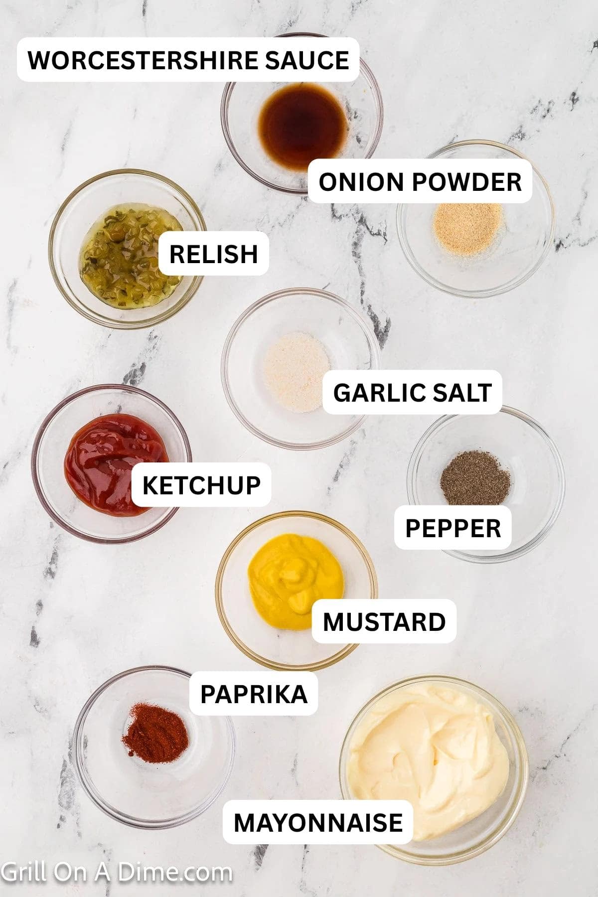 Ingredients needed to make this recipe which includes mayonnaise, ketchup, mustard, relish, worcestershire sauce, garlic salt, onion powder, pepper, and smoked paprika.