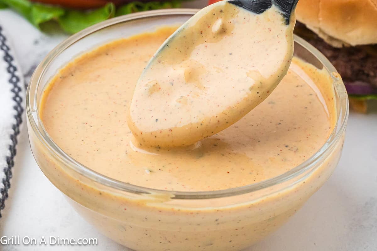 Smash Burger Sauce in a bowl with a serving on a spoon